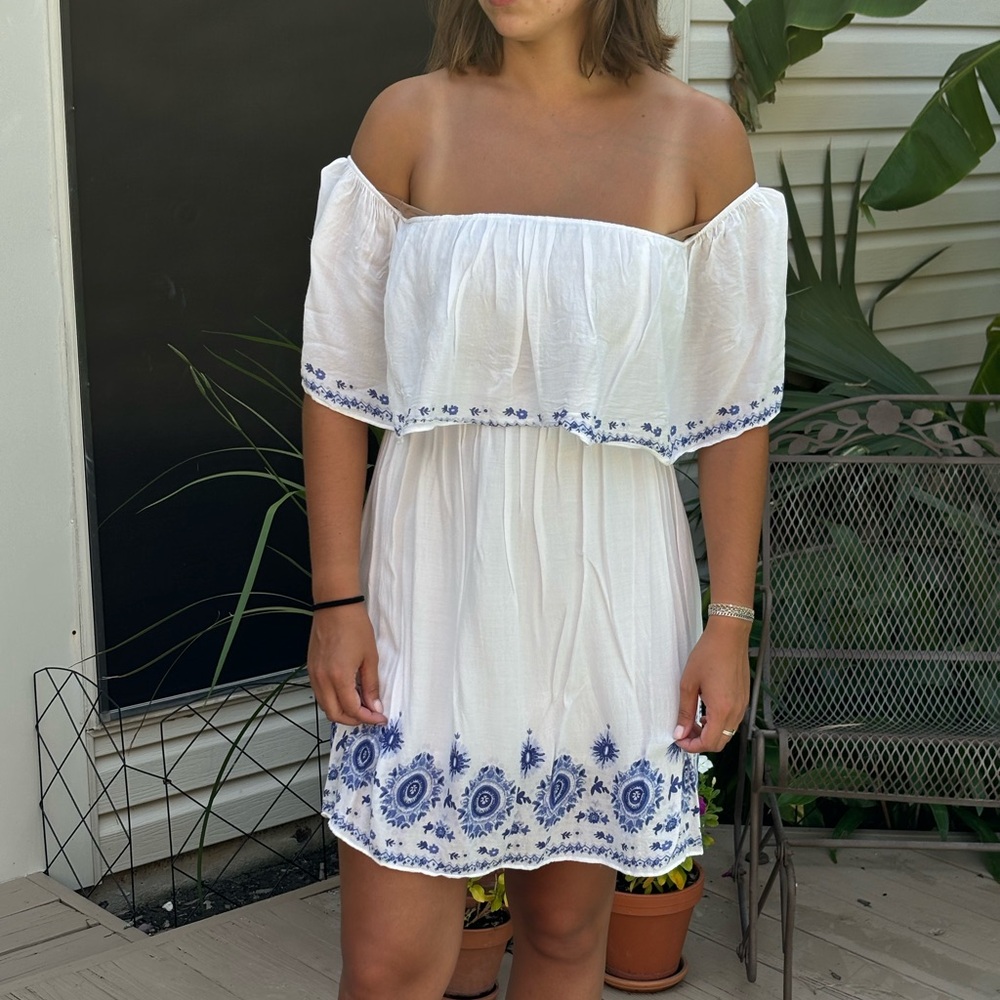 White dress with blue pattern